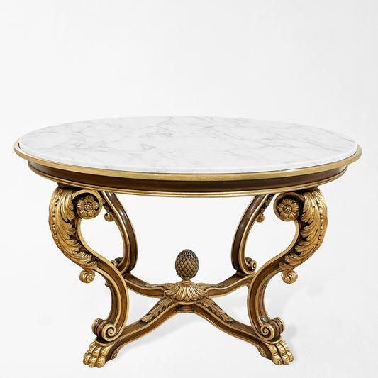A wooden and gold leaf Italian table with a marble top.
