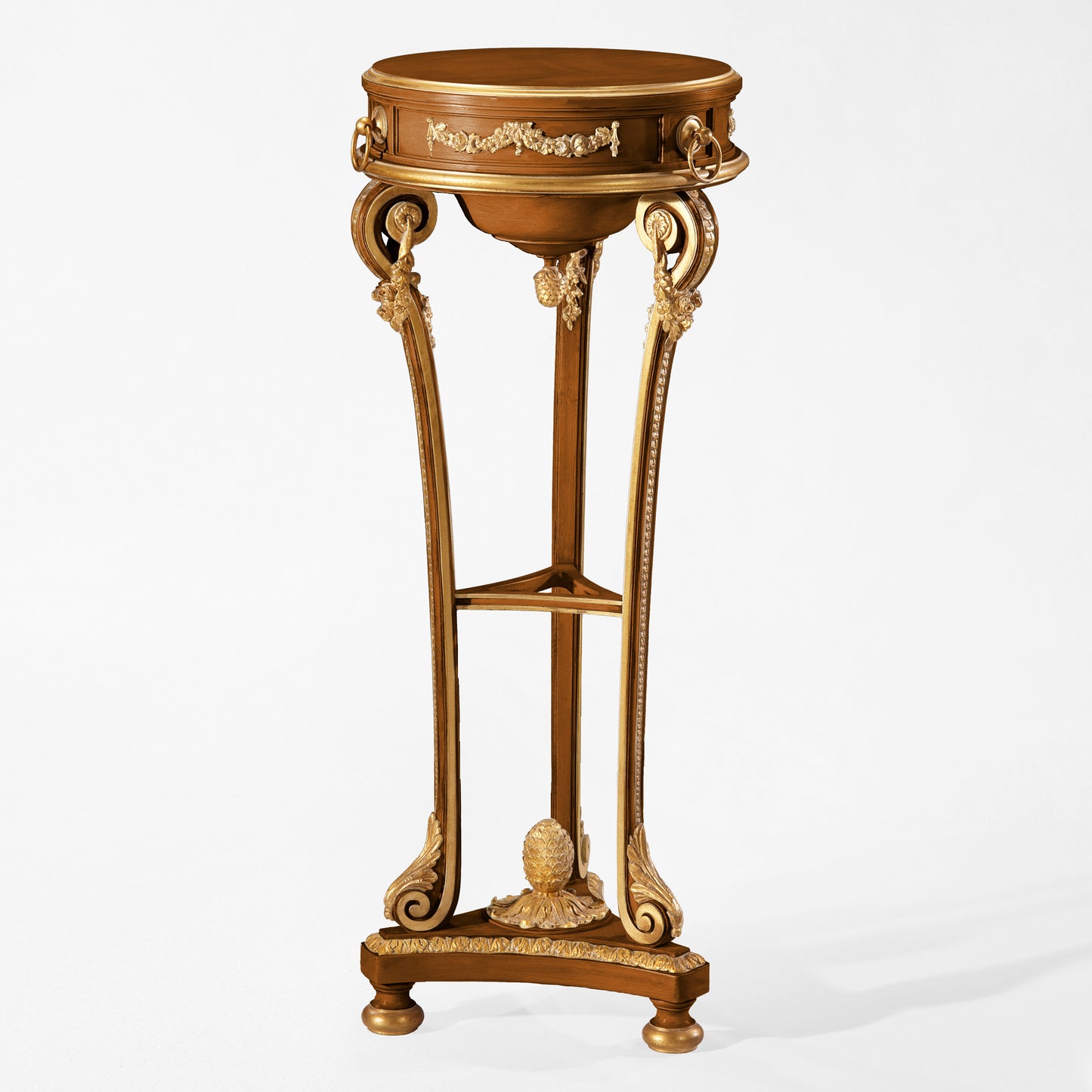Decorative wooden pedestal with intricate gold carved details.