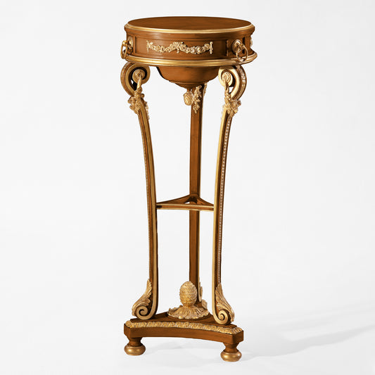 Decorative wooden pedestal with intricate gold carved details.