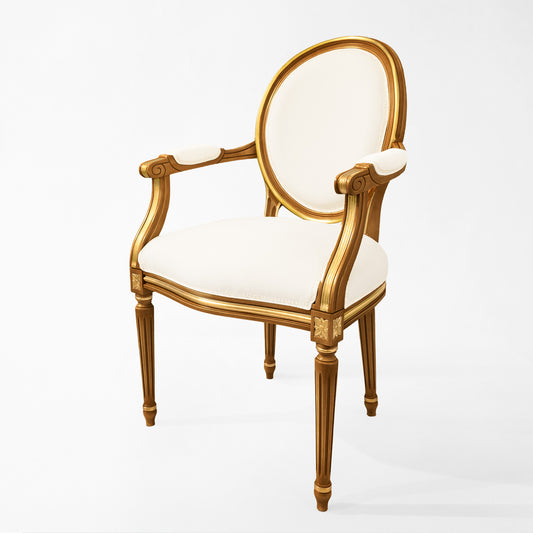 Carved wood Italian chair with cream fabric.