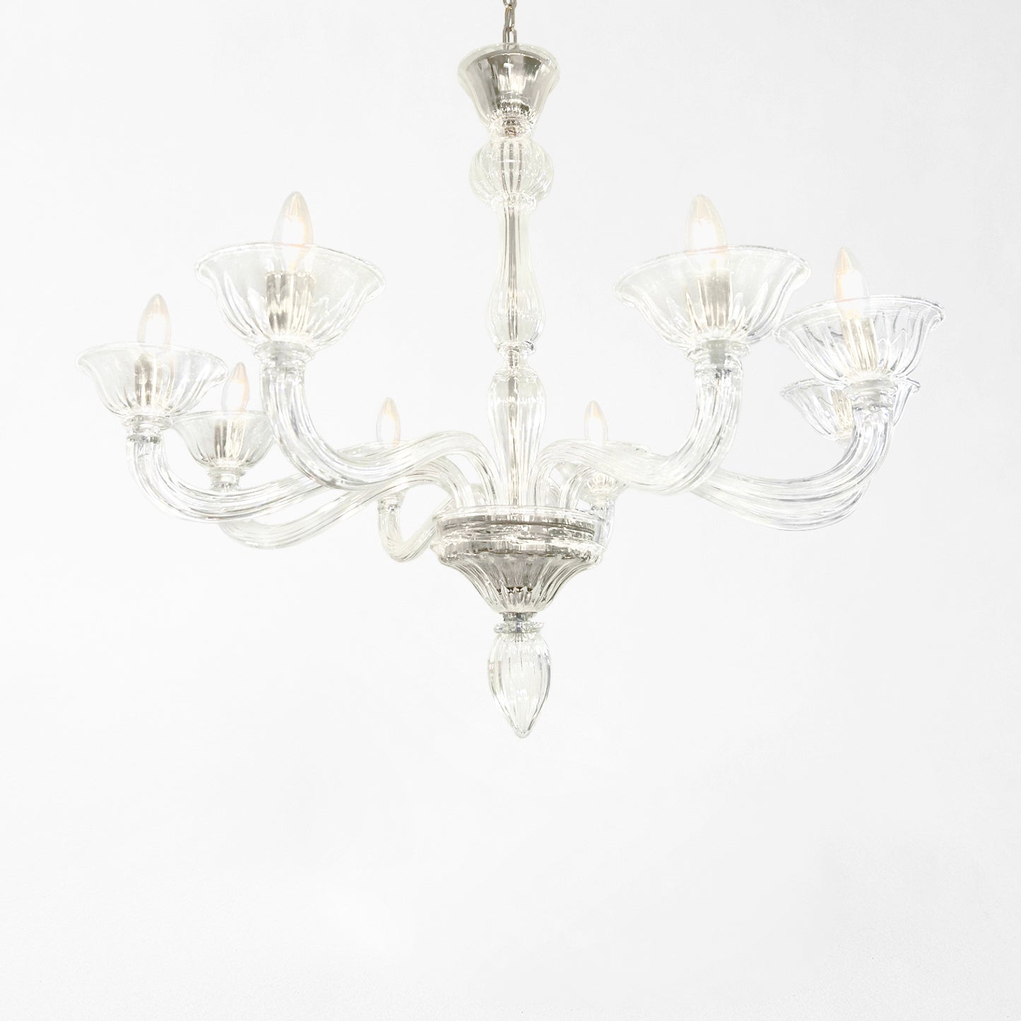 Clear Murano glass chandelier with nickel trim.