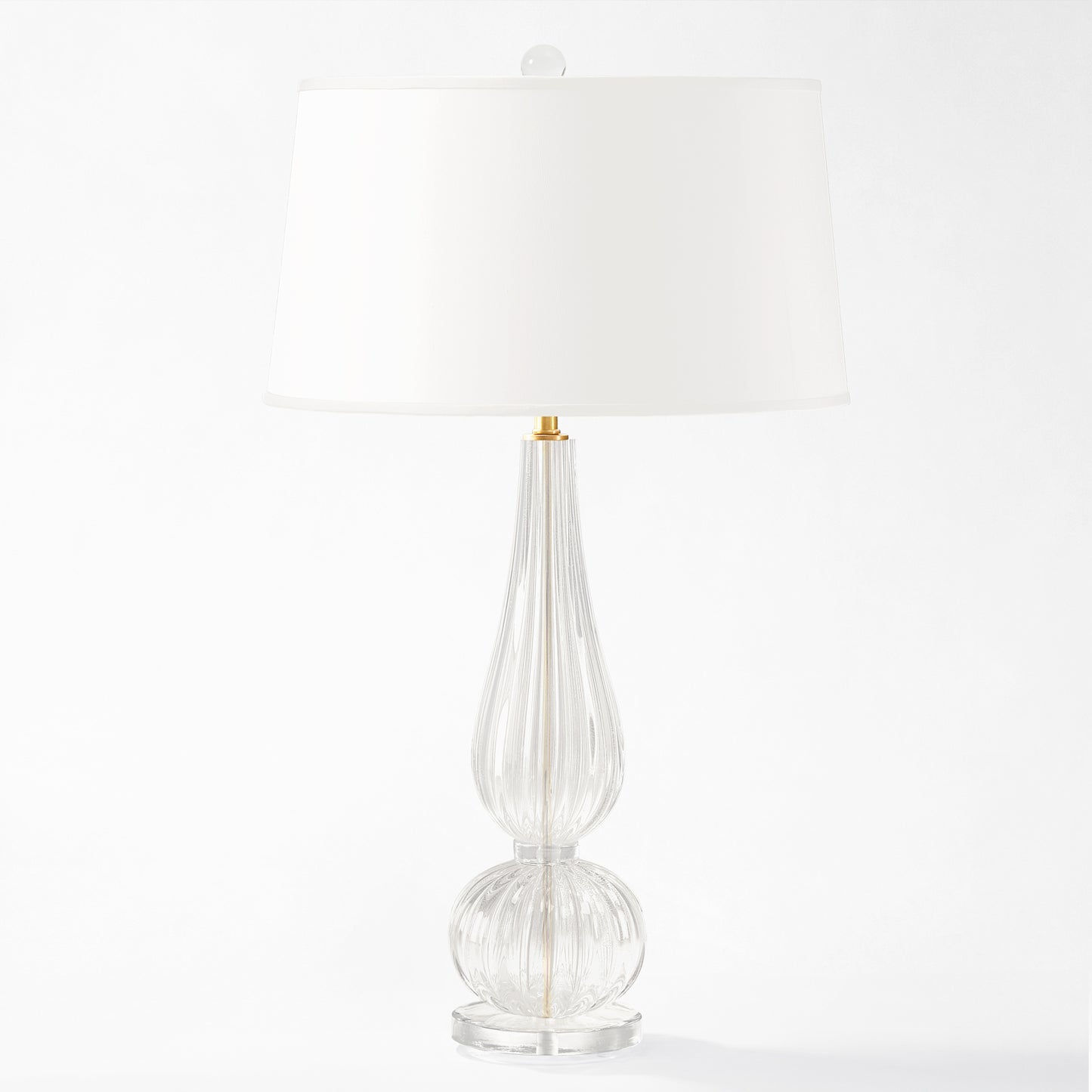 Clear Murano glass lamp with white shade.