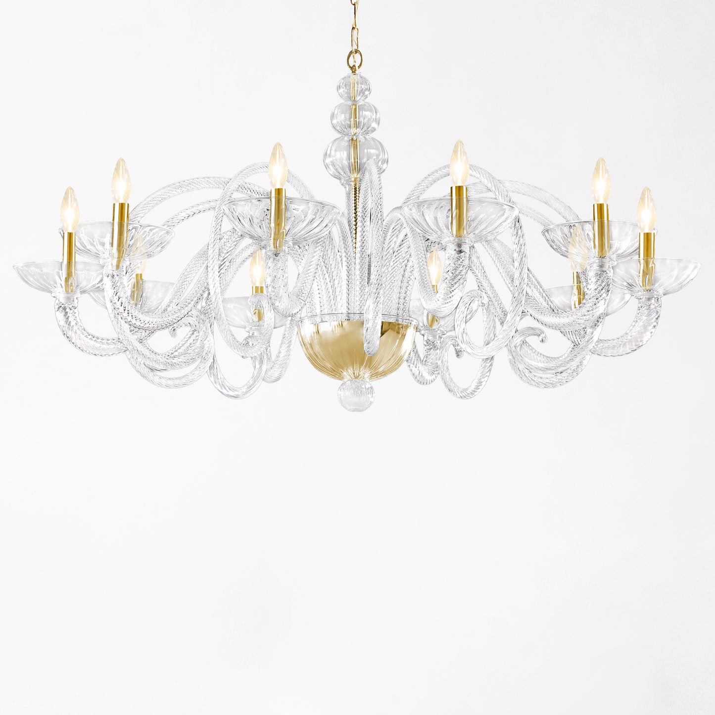 Ornate clear Murano glass chandelier with gold hardware.