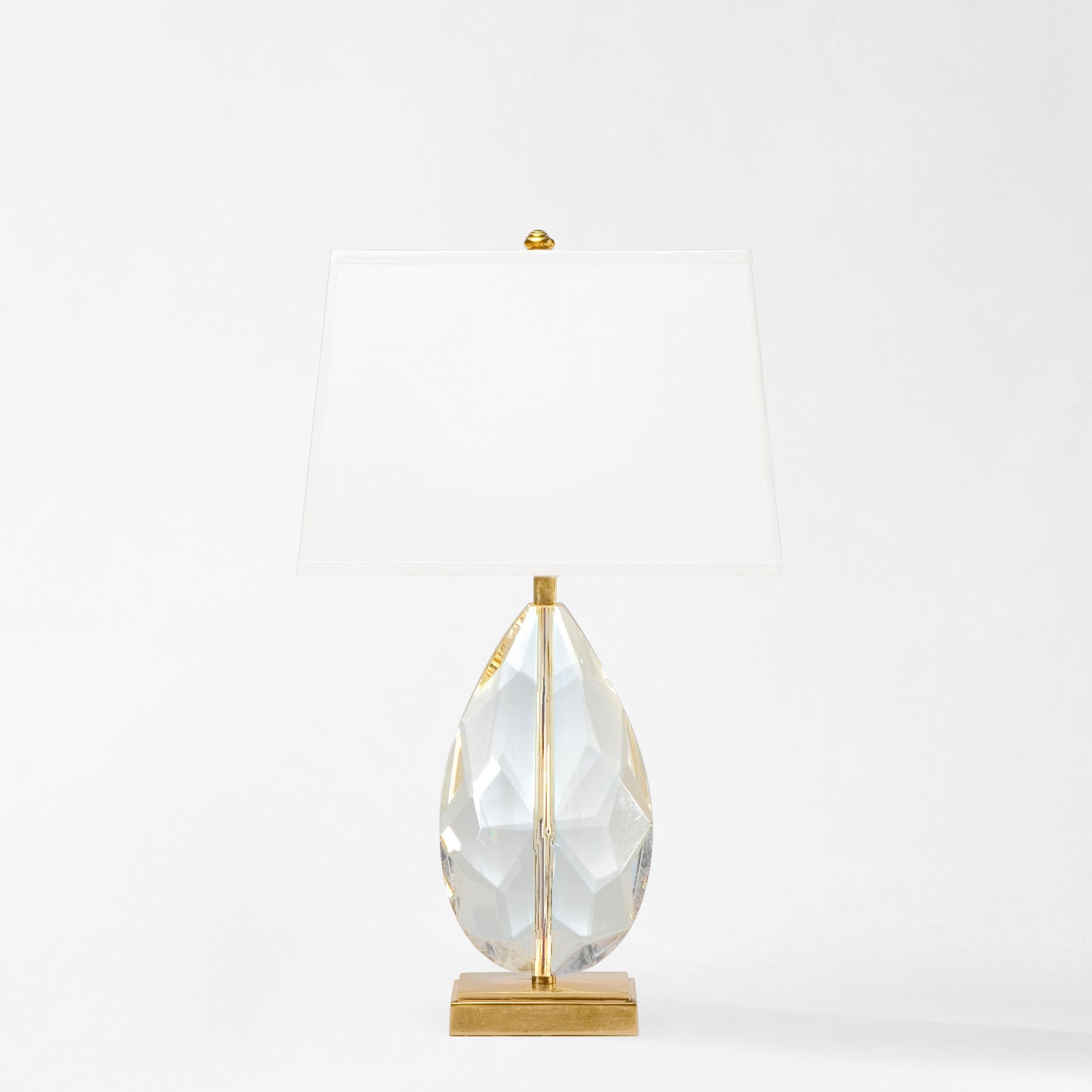 Antique brass and crystal table lamp.