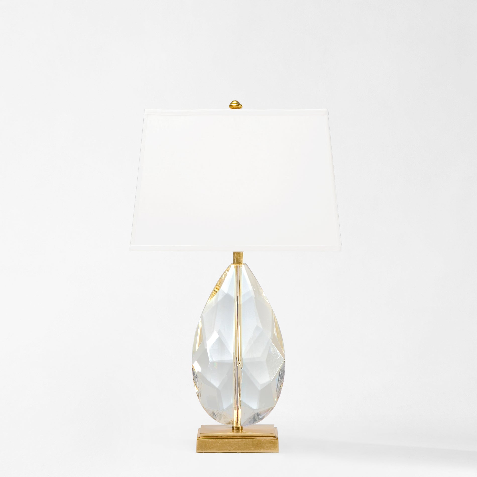 Antique brass and crystal table lamp.