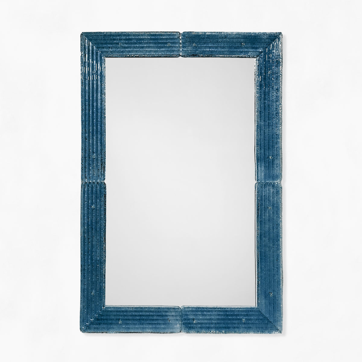 Blue Venetian glass mirror.