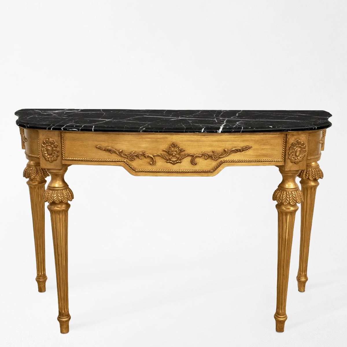 An Italian console table with a black marble top.