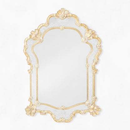 Ornate gold Murano glass mirror.