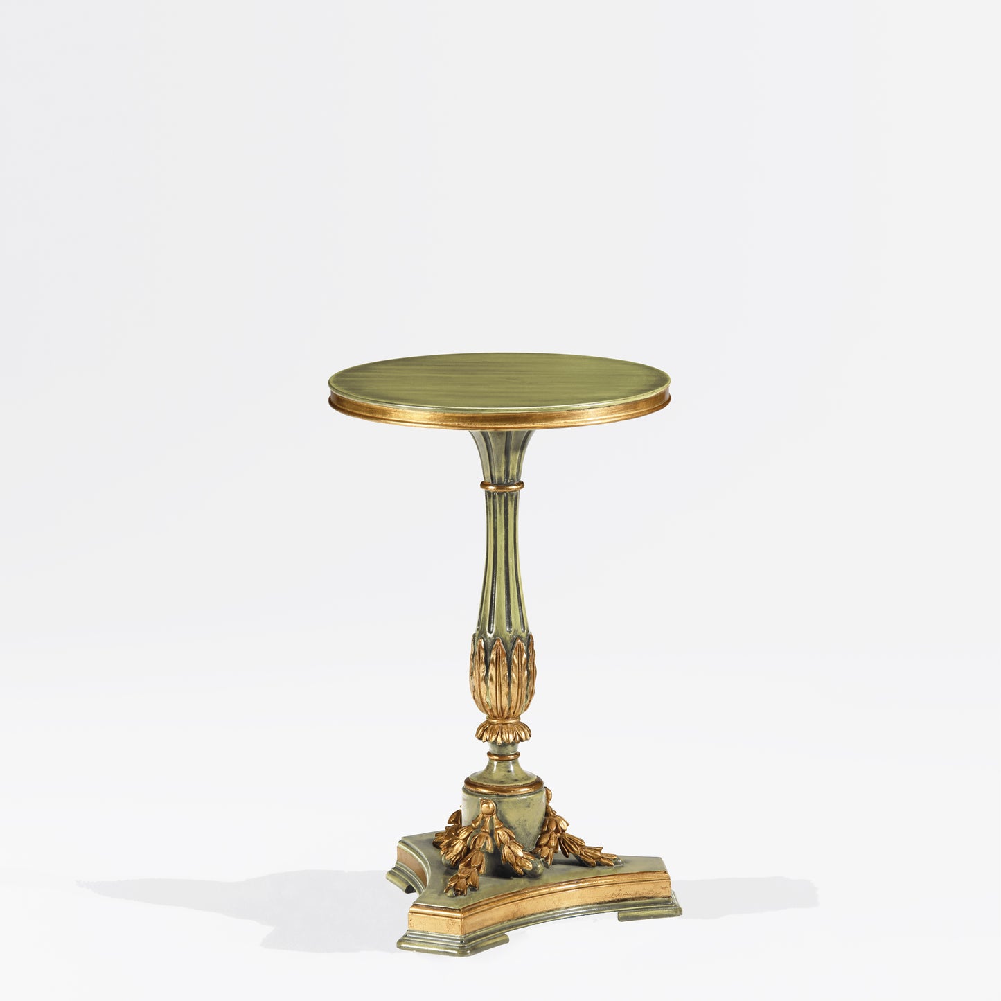 Green Italian accent table with carved gold details.