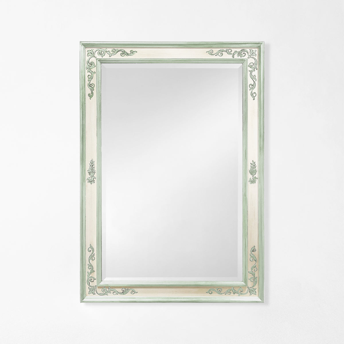 White Italian mirror with green painted details.