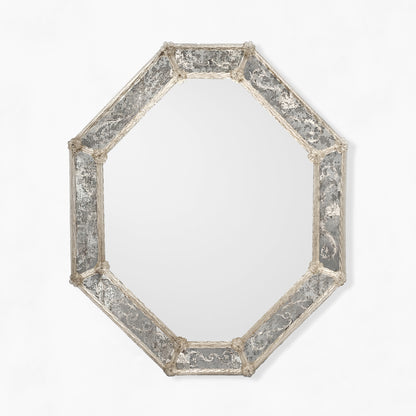 Octagonal Venetian glass mirror with antique frame.