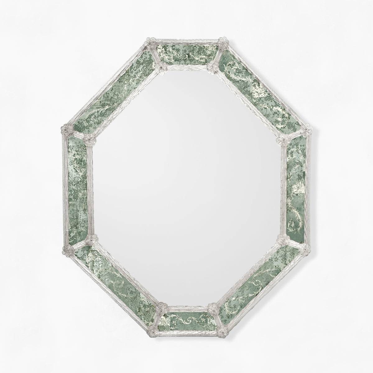 Octagonal Venetian glass mirror with antique green frame.