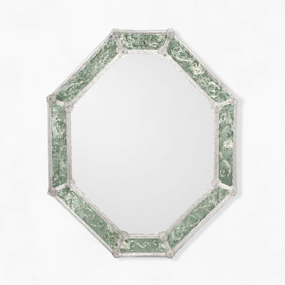 Octagonal Venetian glass mirror with antique green frame.