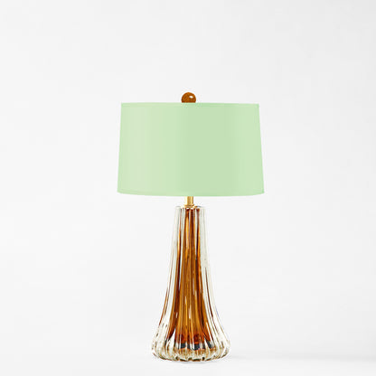 Amber Murano glass table lamp with green lamp shade.