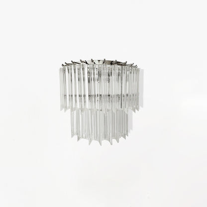Clear glass sconce with nickel hardware.