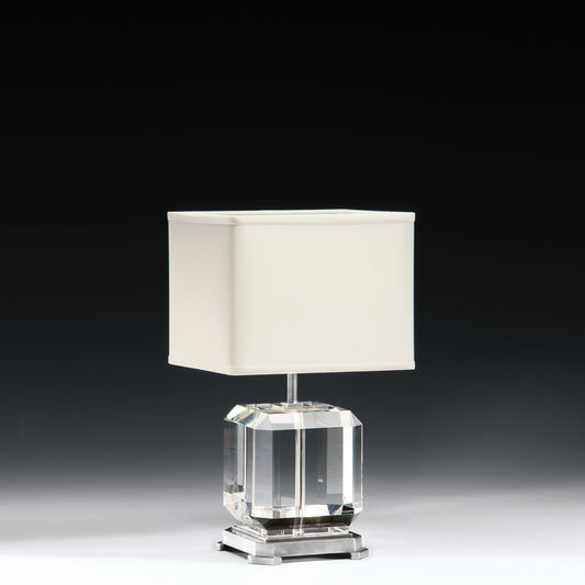Short crystal table lamp with polished nickel accent and modern square shade.