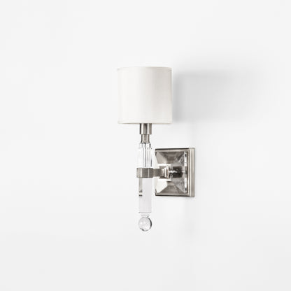 Nickel and crystal sconce.