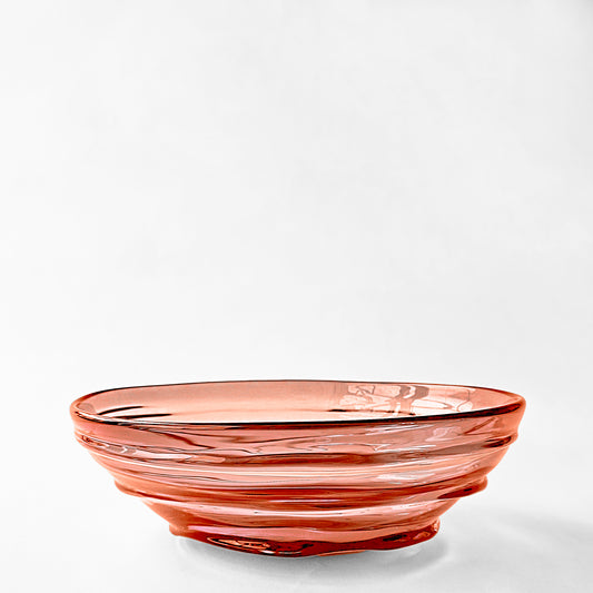 Orange decorative glass bowl.