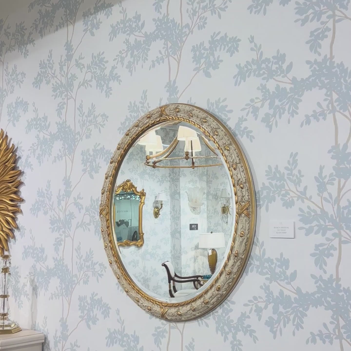 Traditional white Italian mirror with gold details.