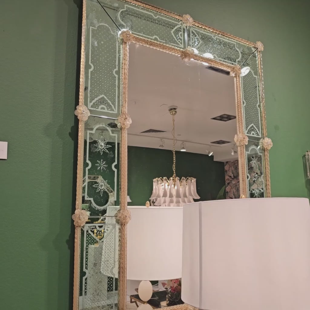 Antique green and gold Venetian-glass mirror.