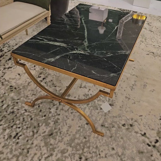 Gold Italian table with green Verde Alpi marble top.