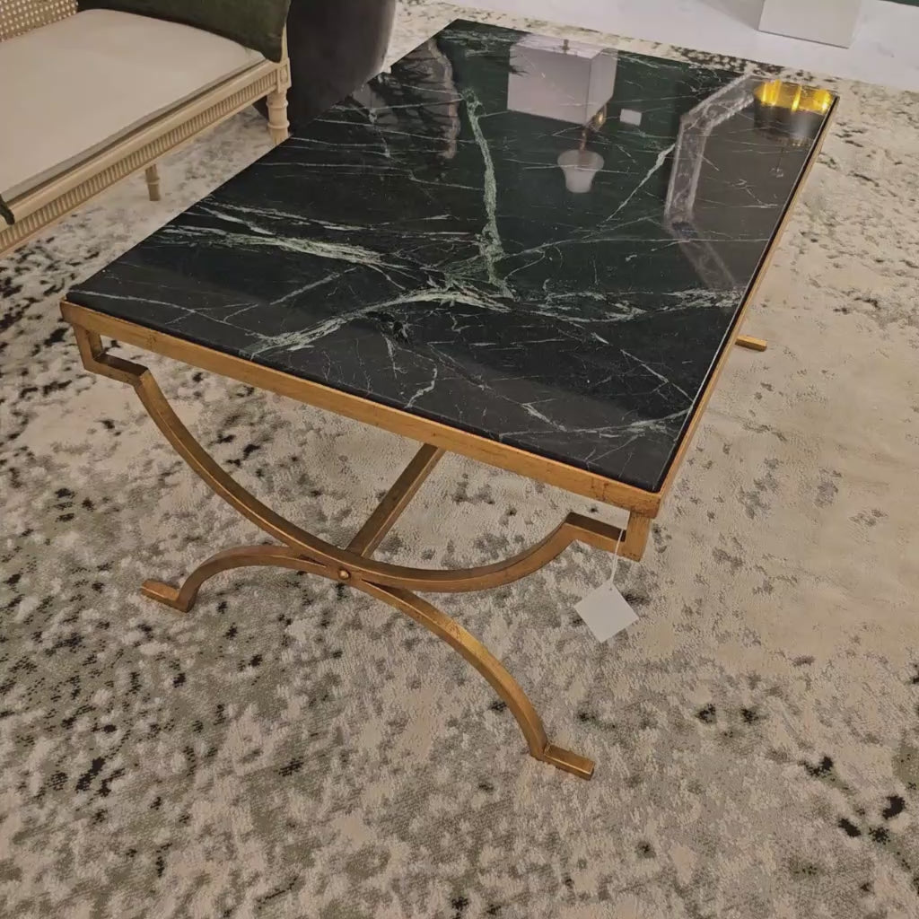 Gold Italian table with green Verde Alpi marble top.