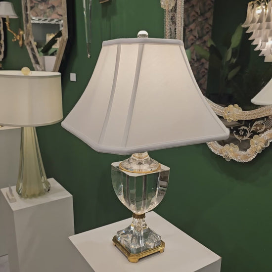 Traditional crystal and antique brass table lamp.