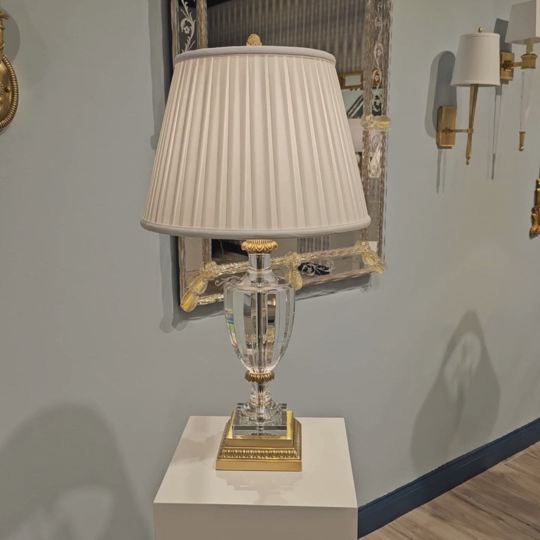 Brass and crystal table lamp with pleated shade.