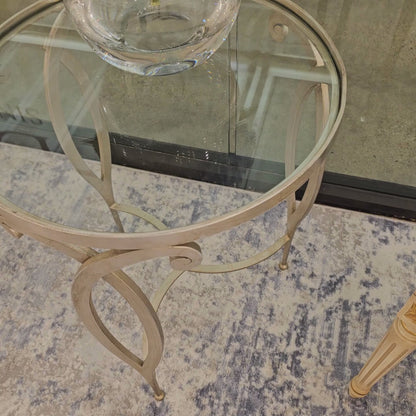 Antique silver side table with glass top.
