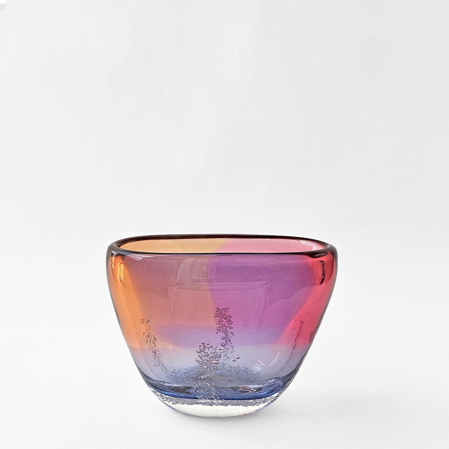 Purple and pink glass decorative bowl.