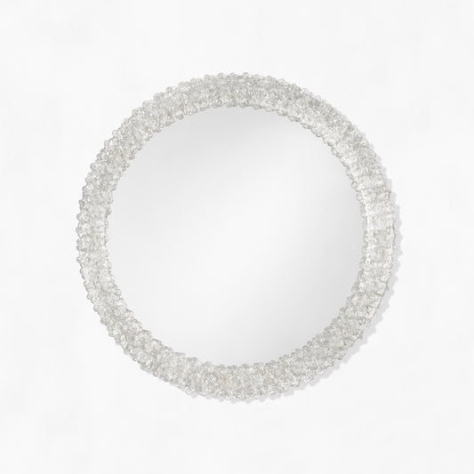 Clear round Murano glass mirror.