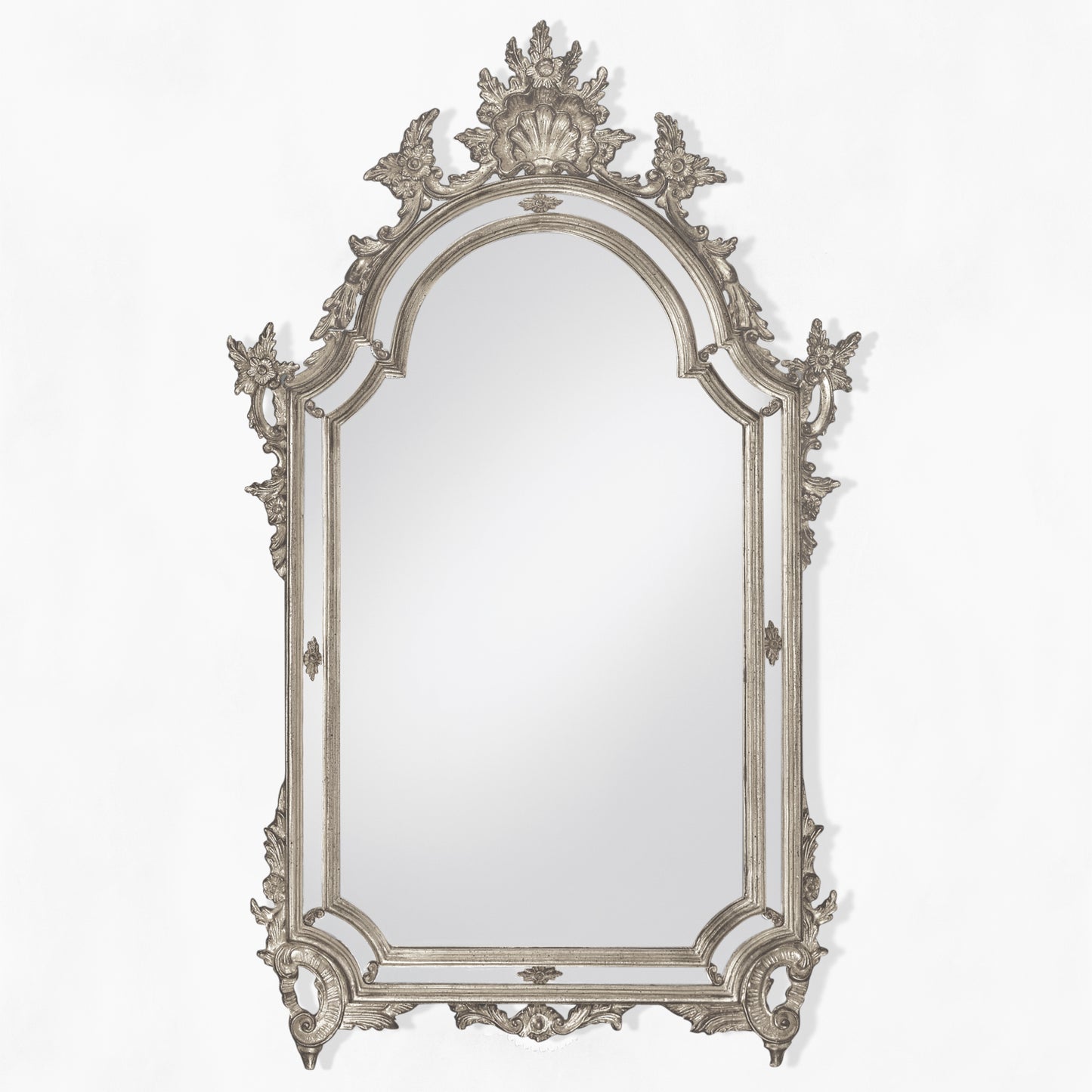 Ornate silver Italian mirror with shell motif.