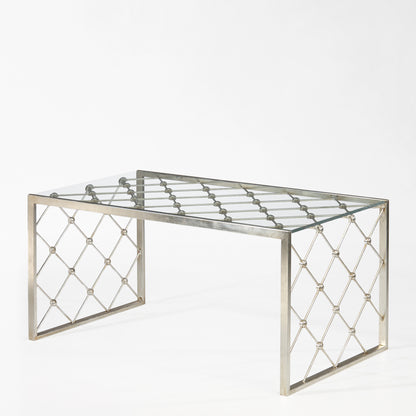 Silver italian table with glass top.