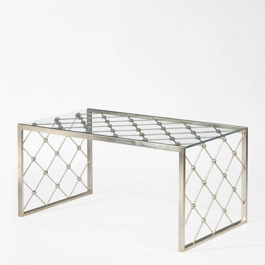 Silver coffee table with glass top.