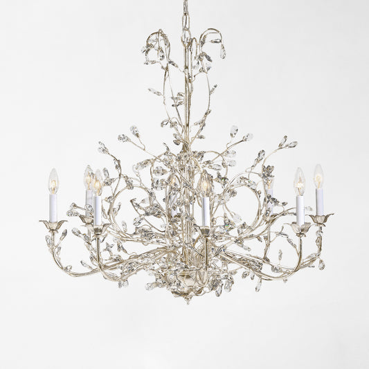 Iron chandelier with silver leaf finish and crystal drops.