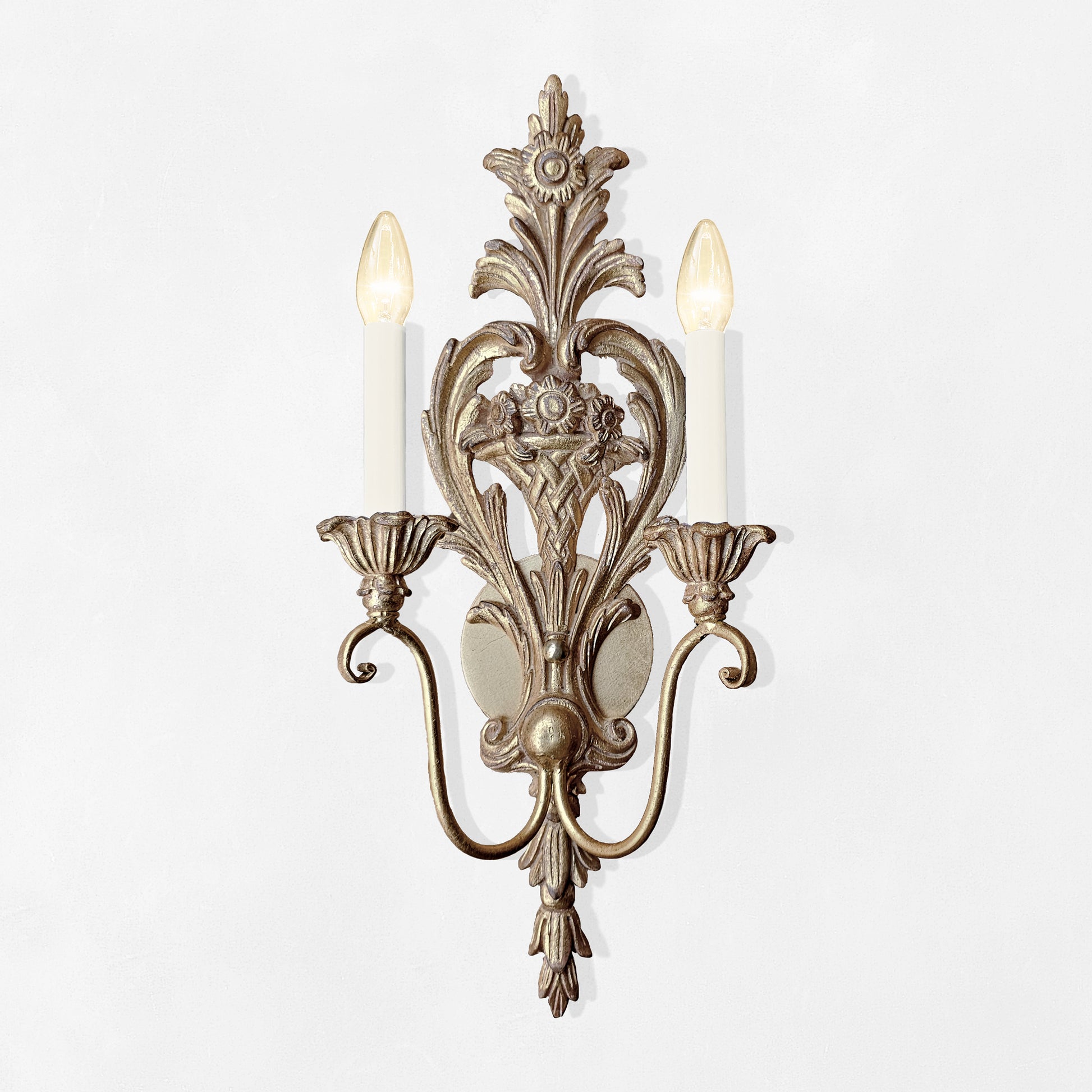 Silver Italian wood sconce.