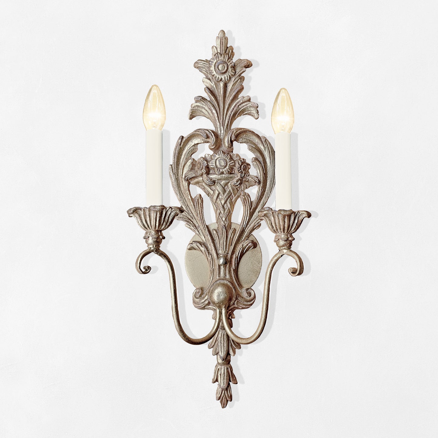 Silver leaf wood sconce.