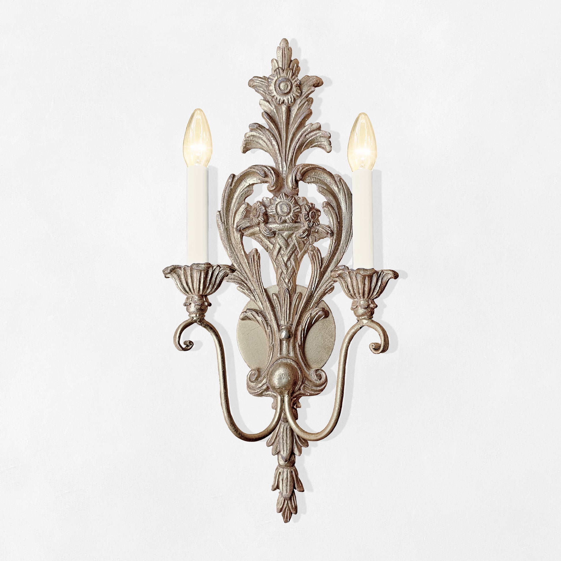 Silver leaf wood sconce.