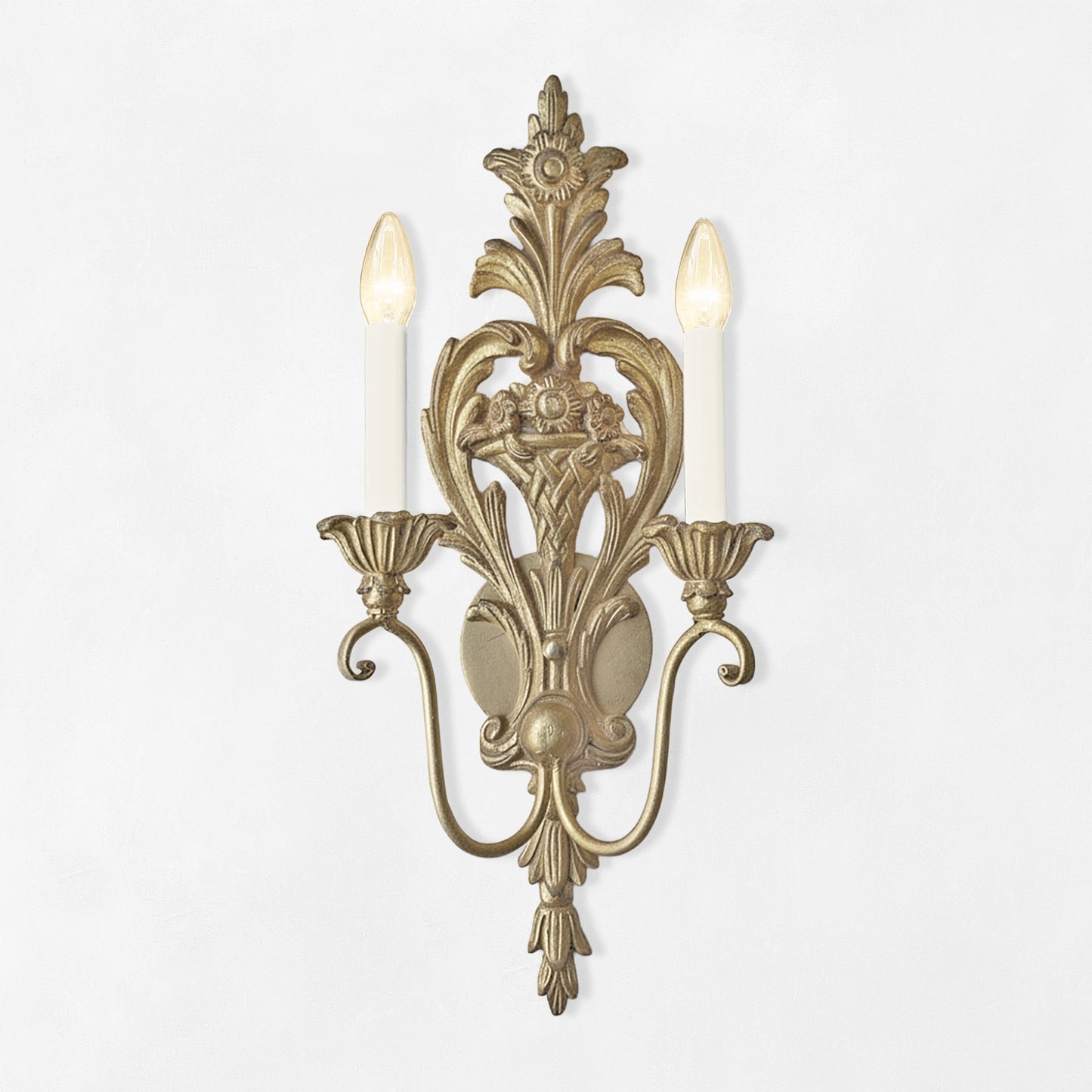 Ornate silver sconce.
