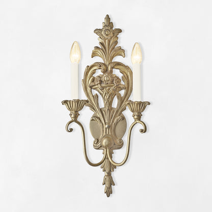 Ornate silver sconce.