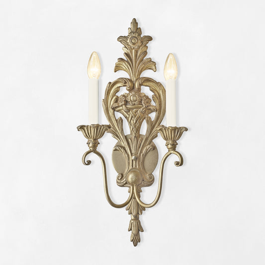Ornate silver sconce.