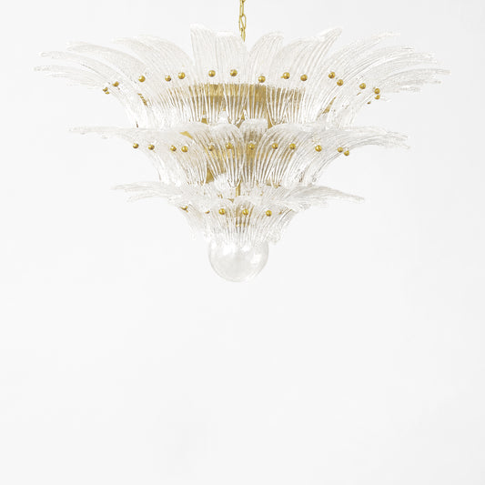 Clear Palm Murano glass chandelier with gold hardware.