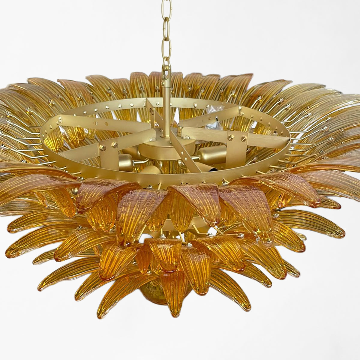 Detail photo of a palm Murano glass chandelier.