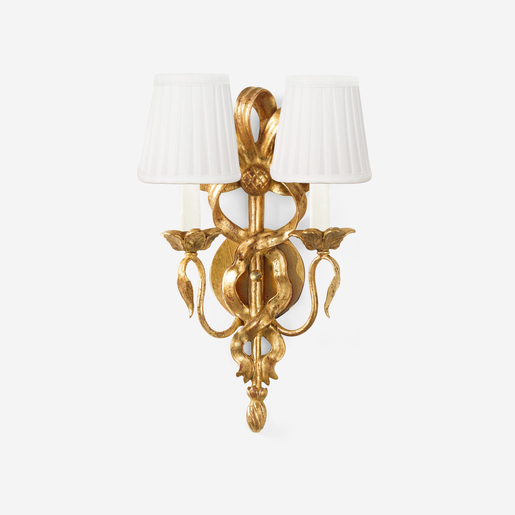 Traditional gold sconce with white pleated shades.