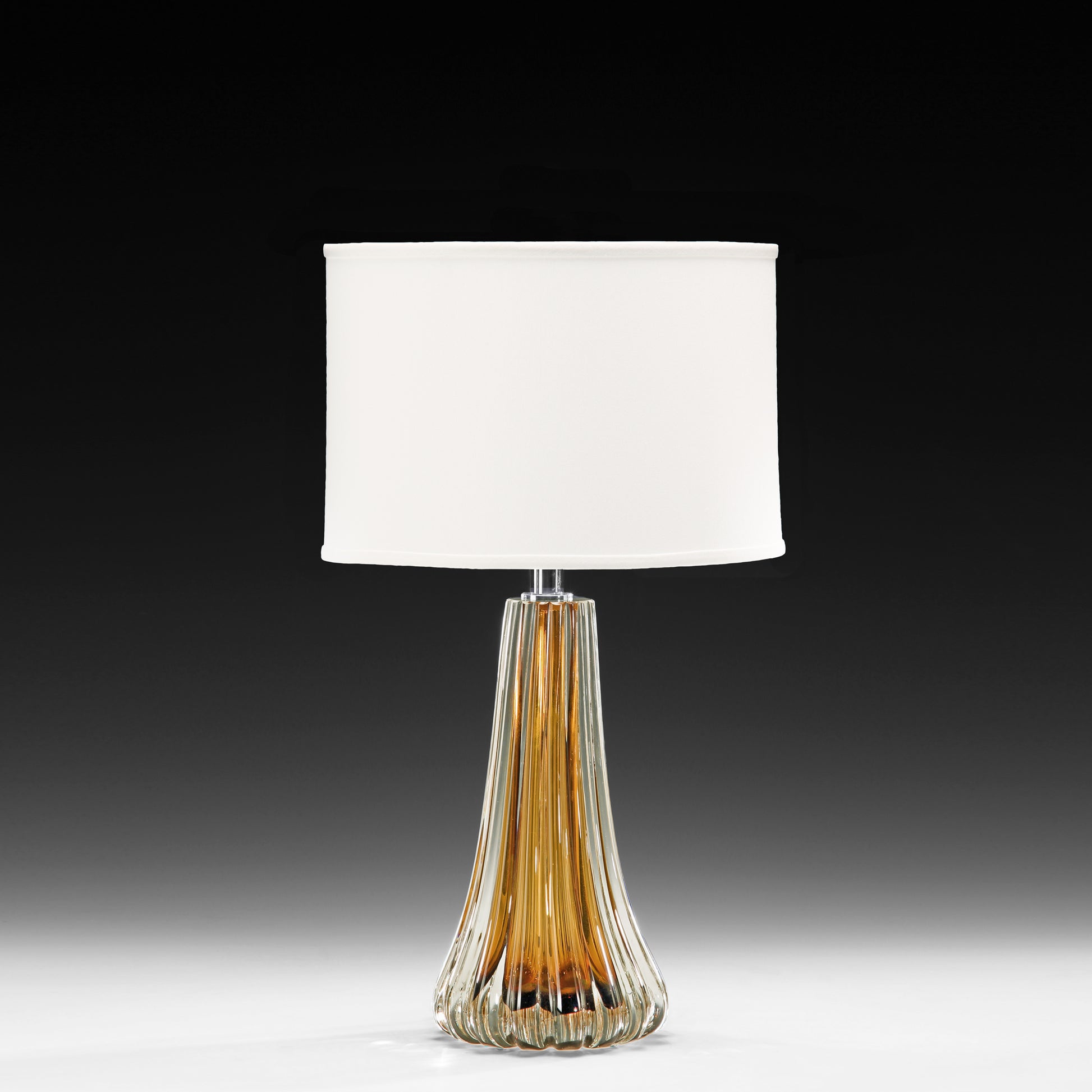Amber Venetian glass table lamp with polished nickel accent.