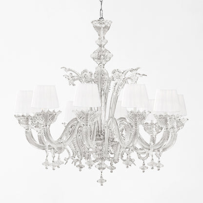 Ornate gray Murano glass chandelier with white shades.