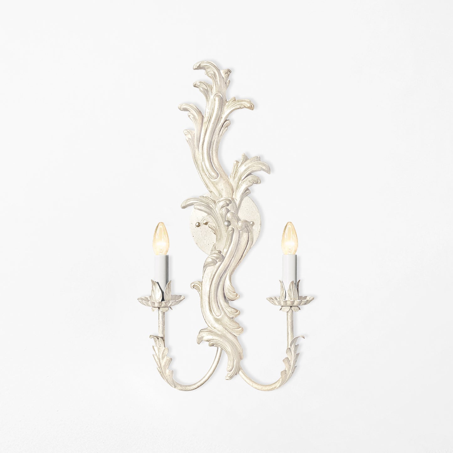 Ornate white Italian sconce.