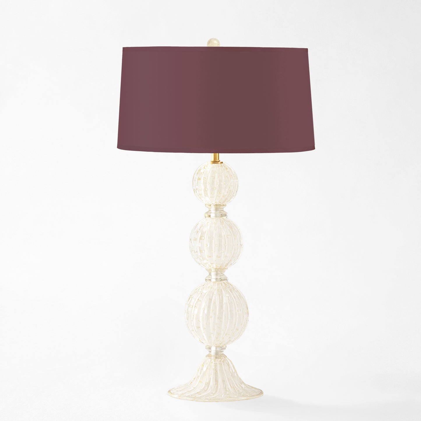 White Murano glass table lamp with burgundy lamp shade.