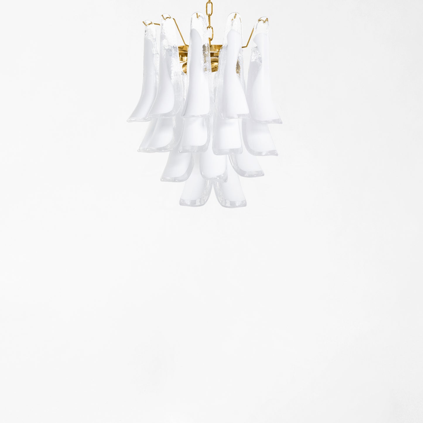 Clear and white Murano glass chandelier with gold hardware.