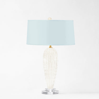 White Murano glass table lamp with light blue lamp shade.